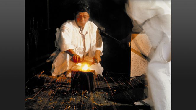 
                    Japanese cutler forging a paring knife