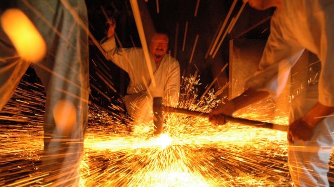 
                    Chinese chef's knife fabricated by damascene cutlers