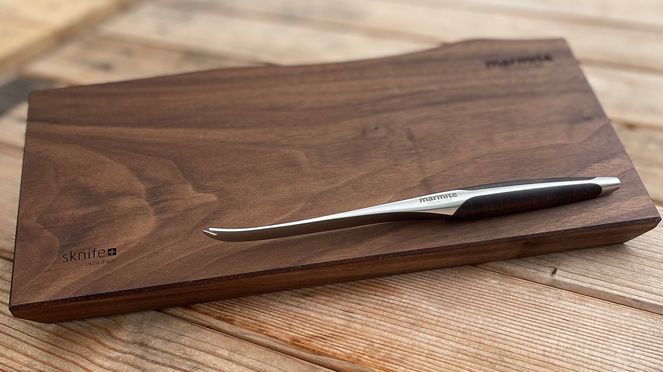 
                    swiss cheese knife with cutting board with integrated magnets